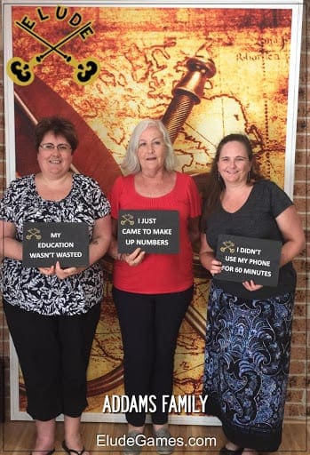 Jane and Family team photo at Elude Escape Rooms